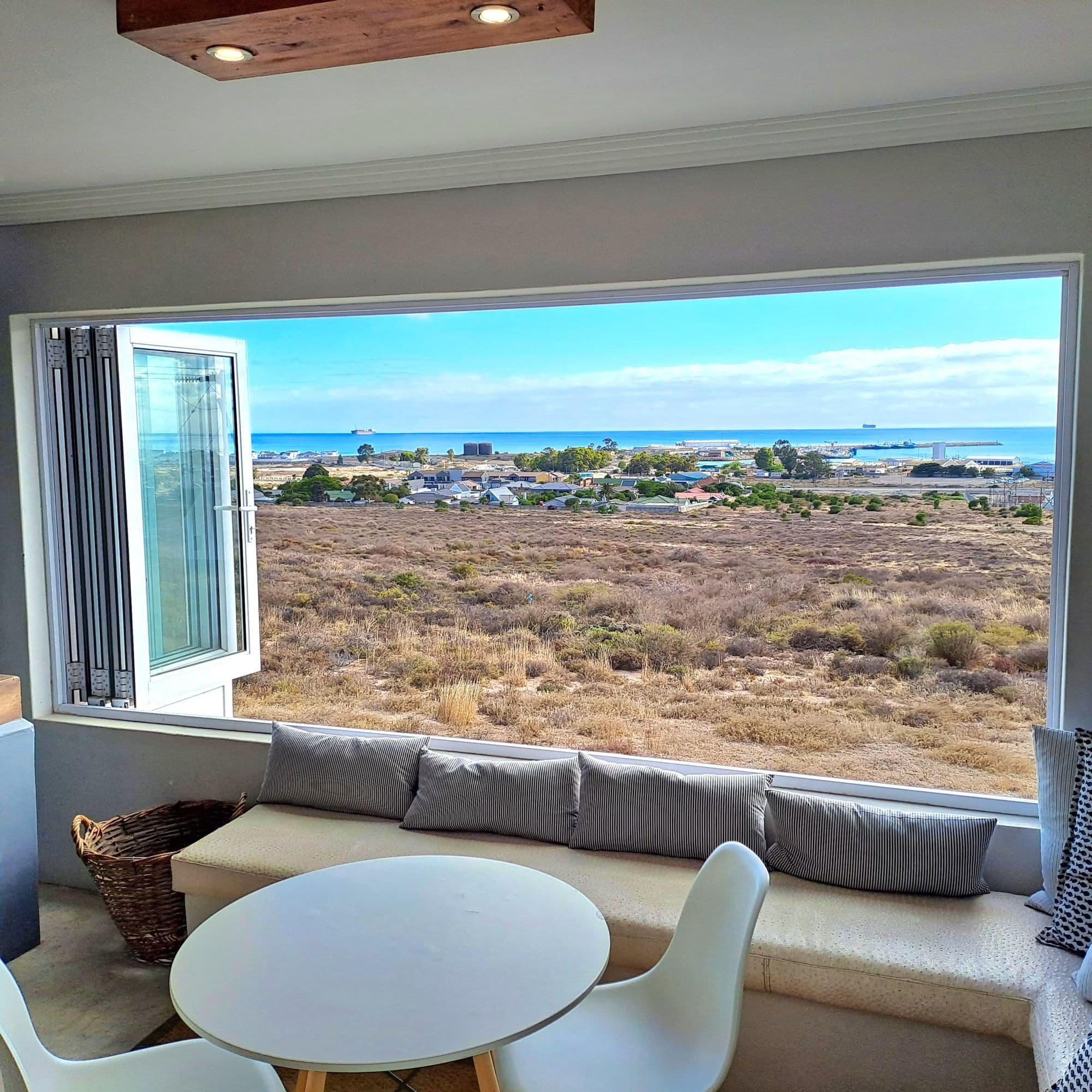 A window seat looking out over the dunes to the harbour